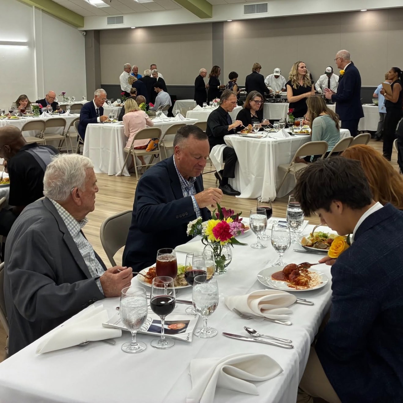 Guests seated at a catered luncheon