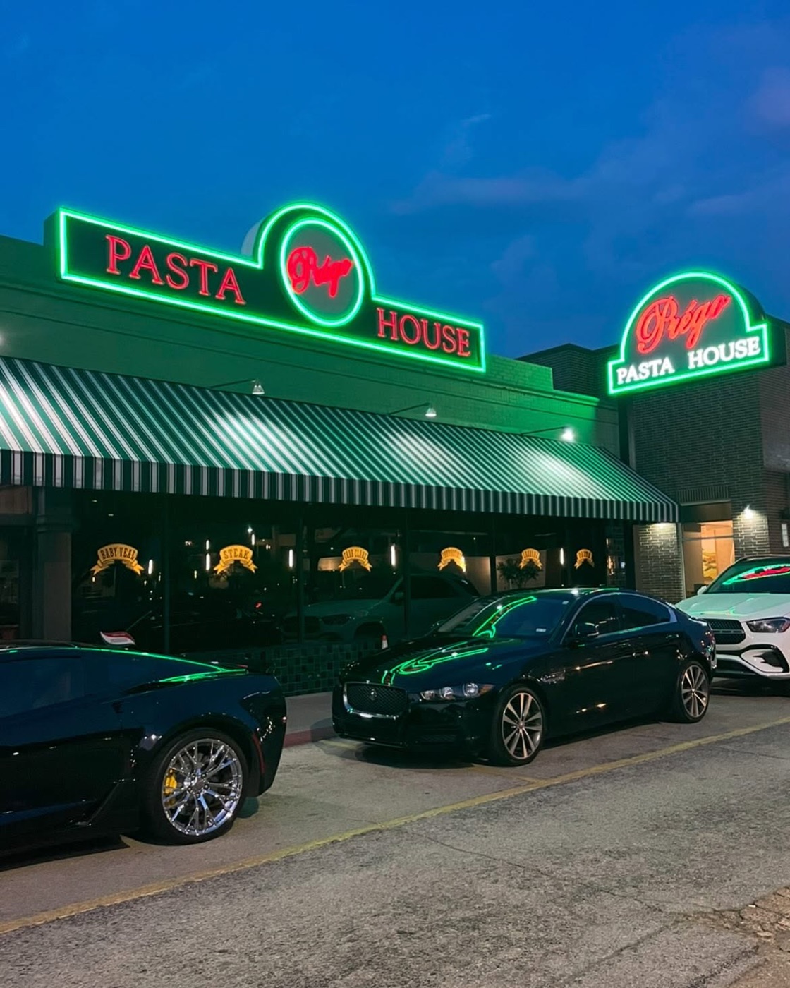 Prego neon sign at dusk